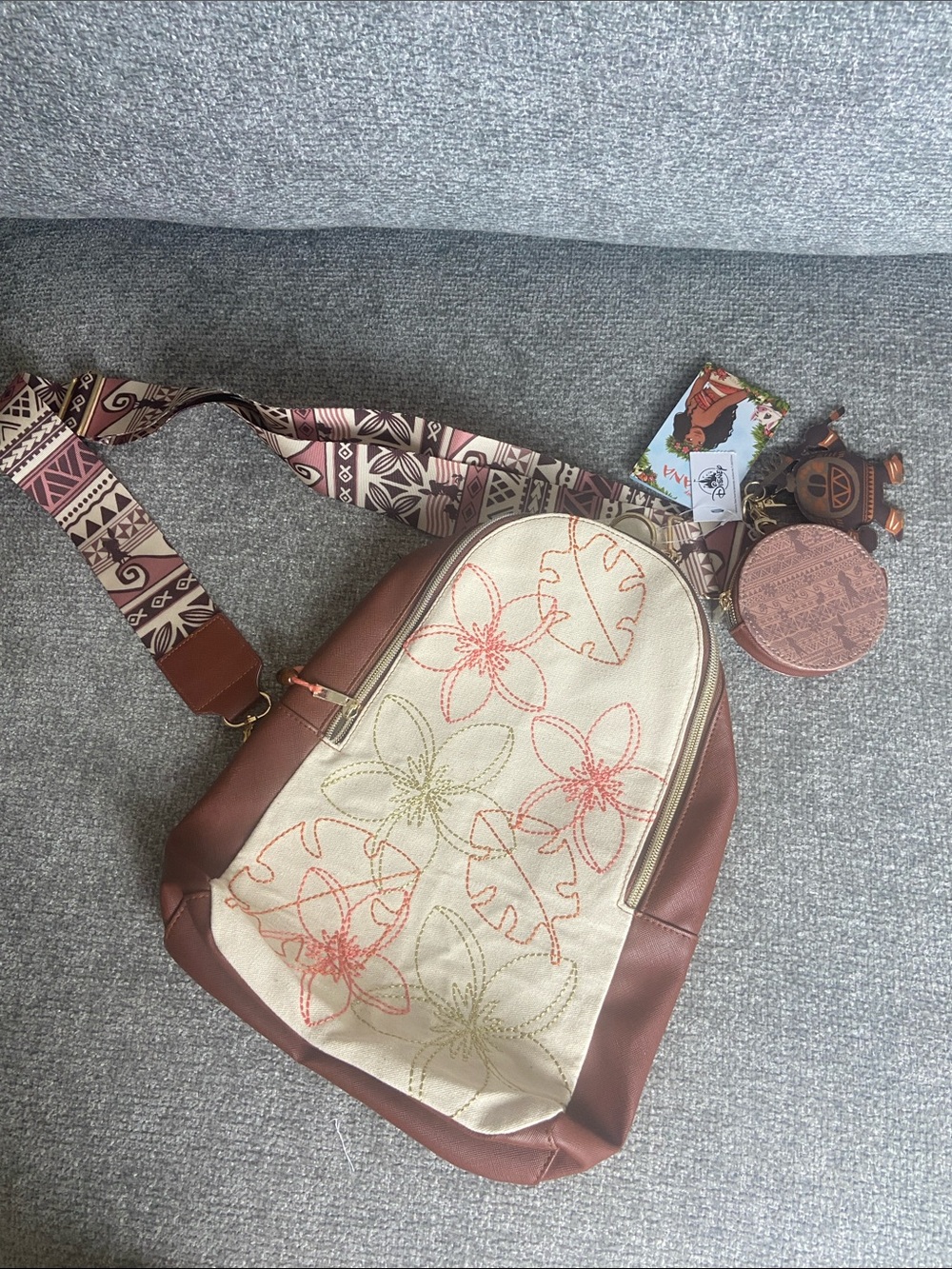 Disney MoanaCream Canvas Crossbody with Brown Trim and Coral Embroidered Flowers